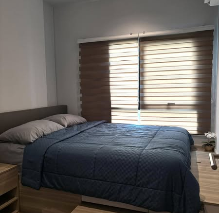 bedroom of Altitude Unicorn Sathorn