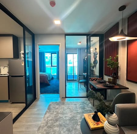 living room and room interior of Atmoz Palacio Ladprao Wanghin | แอทโมซ พาลาซิโอ ลาดพร้าว วังหิน