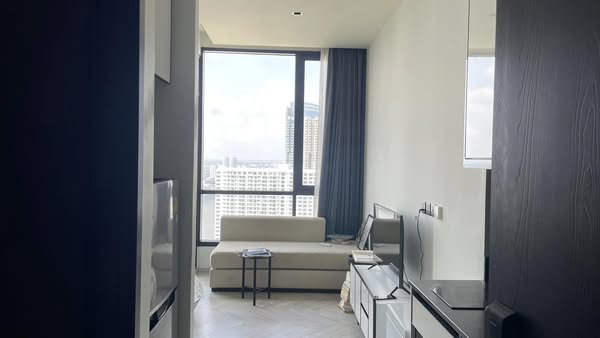 bedroom and living room of Chapter Charoennakhon–Riverside