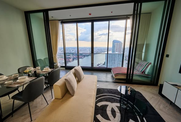 living room and bedroom of Chapter Charoennakhon–Riverside