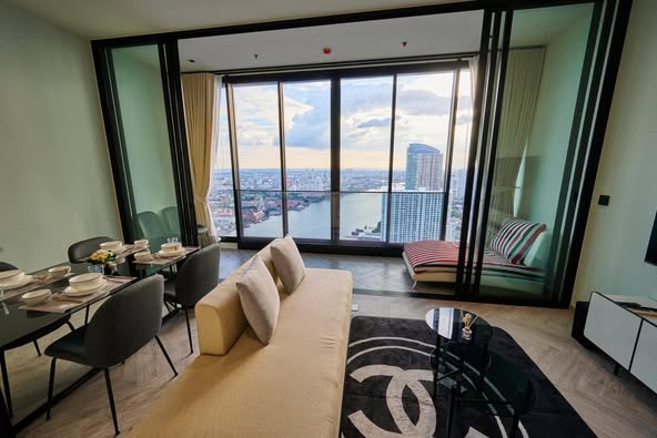 living room and bedroom of Chapter Charoennakhon–Riverside