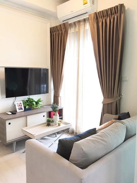 bedroom and living room of Chapter One Eco Ratchada-HuaiKhwang
