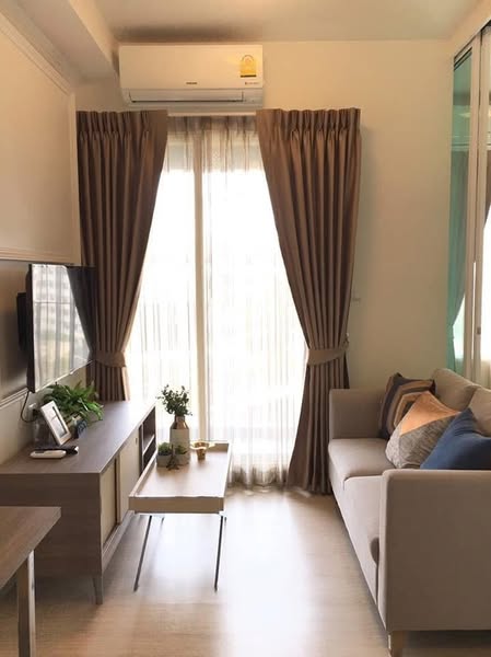 living room and bedroom of Chapter One Eco Ratchada-HuaiKhwang
