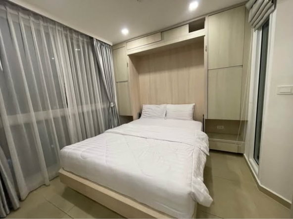 bedroom of City Garden Olympus Condominium