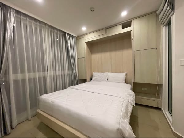 bedroom of City Garden Olympus Condominium