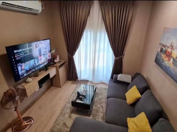 living room and bedroom of he Connect Ramindra - Minburi