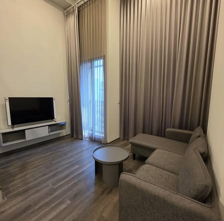 living room and bedroom of KnightsBridge Space Rama9