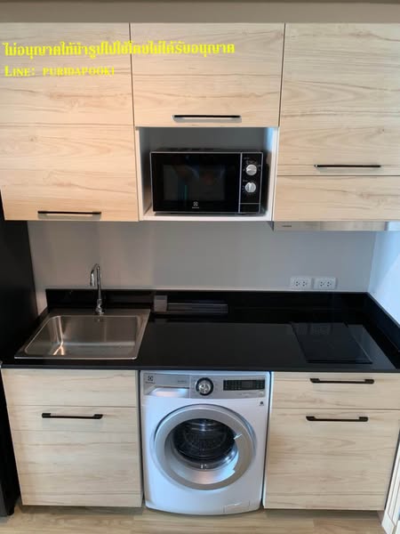 kitchen of Ladda Plus Condominium Sriracha