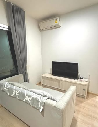 living room and bedroom of Noble Revolve Ratchada 1