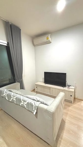 living room and bedroom of Noble Revolve Ratchada 1
