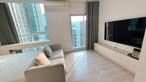 living room and bedroom of Noble Revolve Ratchada 1