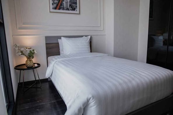 bedroom of Park​ Origin​ Thonglor