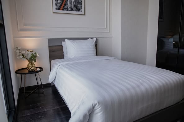 bedroom of Park​ Origin​ Thonglor