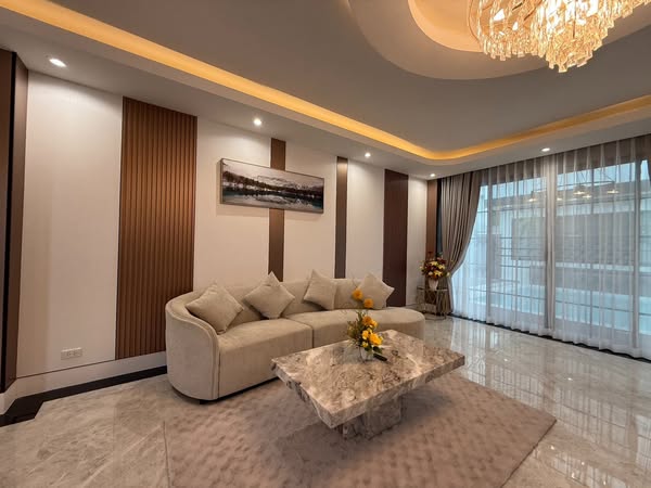 bedroom and living room of บ้านพัก PK Pool Villa ชะอำ