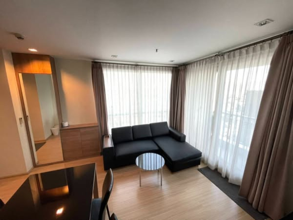 bedroom and living room of RHYTHM Ratchada-Huaykwang