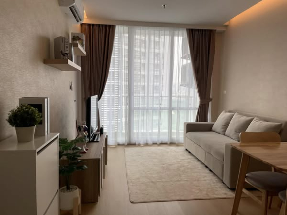bedroom and living room of TC-Green Condominium