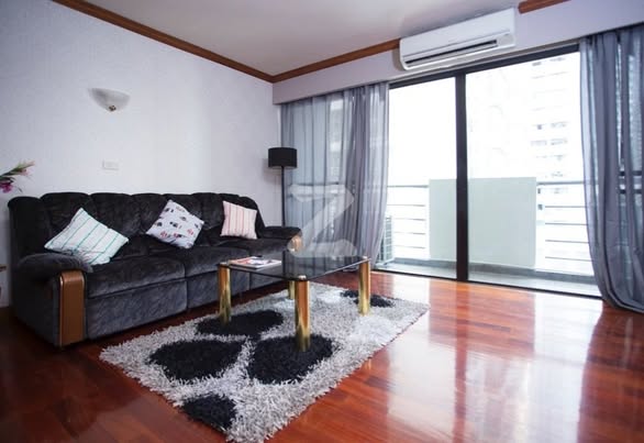 bedroom and living room of The Grand