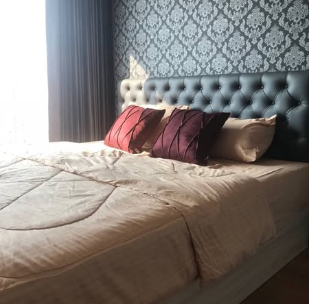 bedroom of The Lumpini 24
