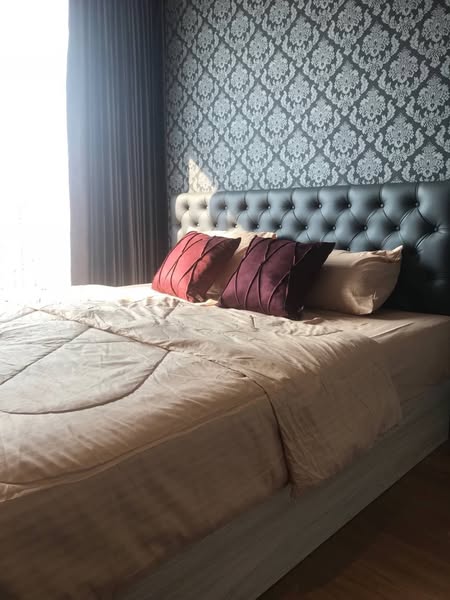 bedroom of The Lumpini 24