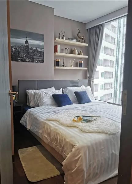 bedroom of The Lumpini 24