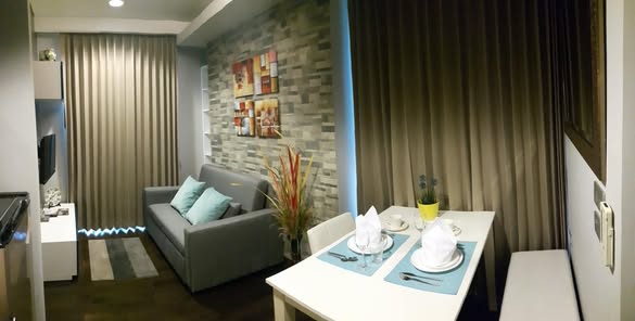 bedroom and living room of The Lumpini 24