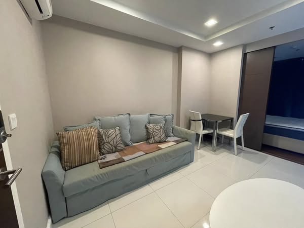 bedroom of The Metropolis Samrong