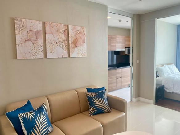bedroom and living room of The Metropolis Samrong