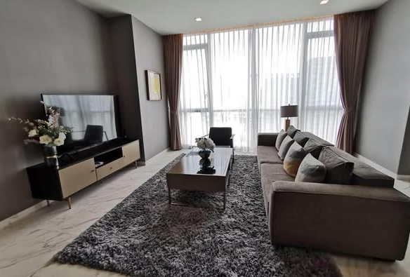 bedroom and living room of The Monument Thong Lo