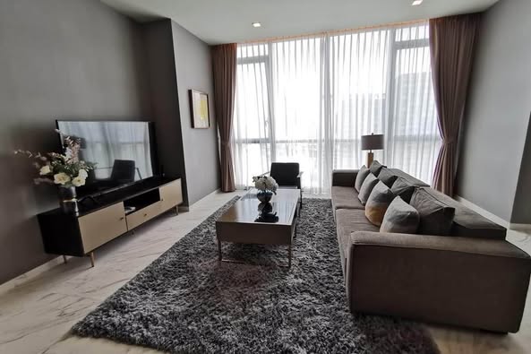 bedroom and living room of The Monument Thong Lo
