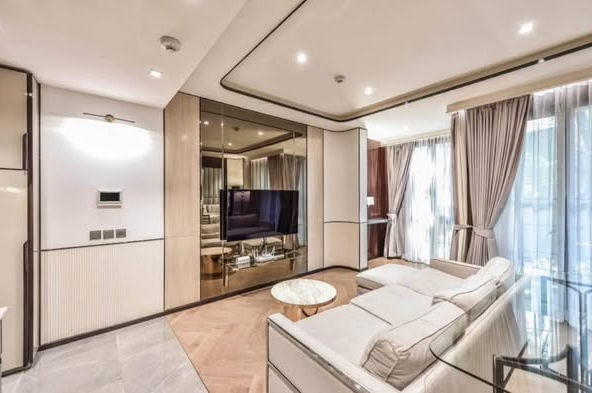 living room and bedroom of The Reserve Sukhumvit 61
