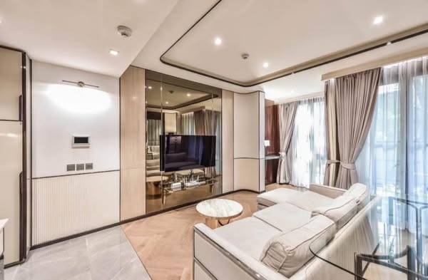living room and bedroom of The Reserve Sukhumvit 61