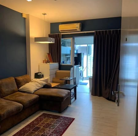 bedroom and living room of The Room Ratchada-Ladprao