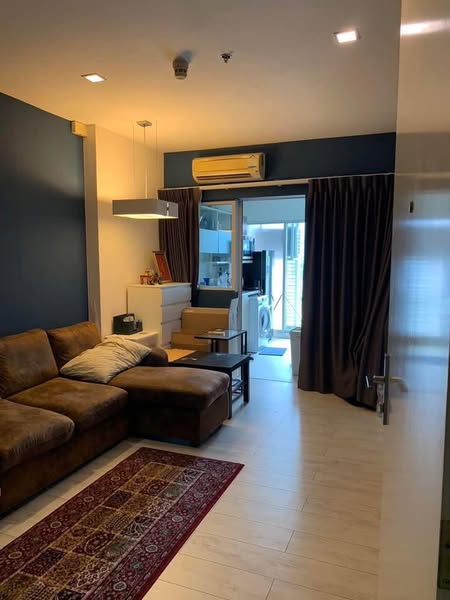 bedroom and living room of The Room Ratchada-Ladprao