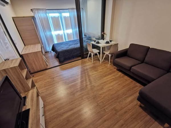 living room and bedroom of The Tree Rio Bang-Aor Station