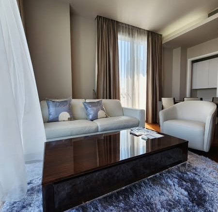bedroom and living room of Quattro by Sansiri