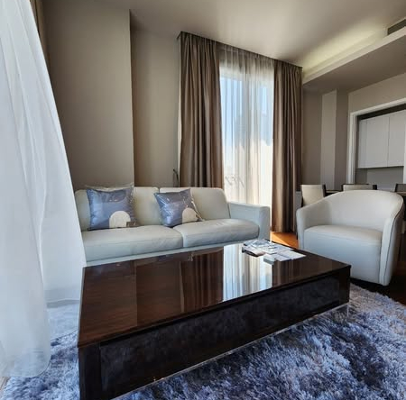 bedroom and living room of Quattro by Sansiri