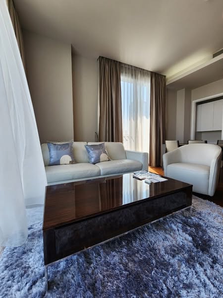 bedroom and living room of Quattro by Sansiri