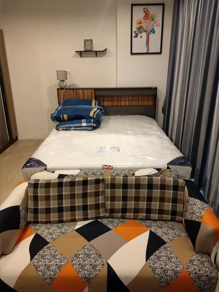 bedroom of คอนโดพราวด์ พอสโต้