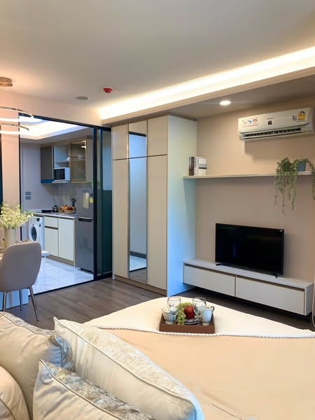 bedroom and living room of Casa Condo ช้างเผือก