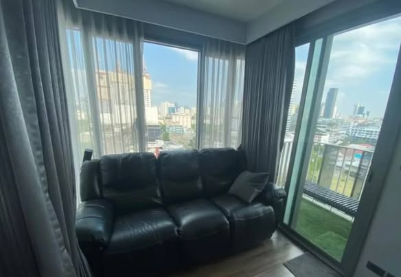 bedroom and living room of CEIL By Sansiri