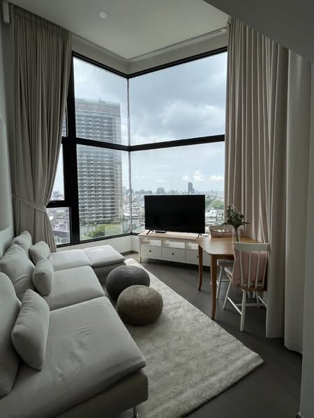 bedroom and living room of Park Origin Chula-Sam Yan