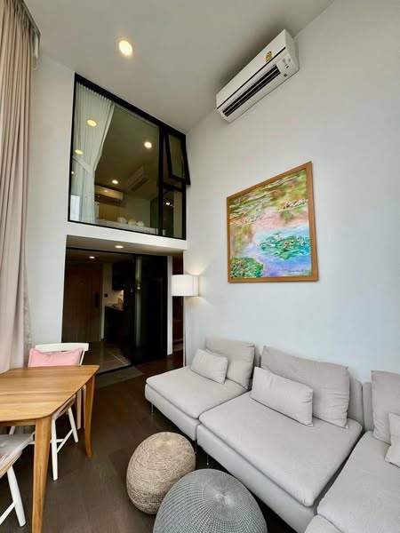 living room and bedroom of Park Origin Chula-Sam Yan