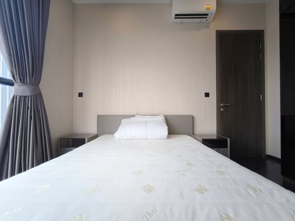 bedroom of Park​ Origin​ Thonglor
