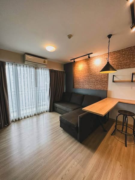 living room and bedroom of Rill Condo ริลล์ คอนโด