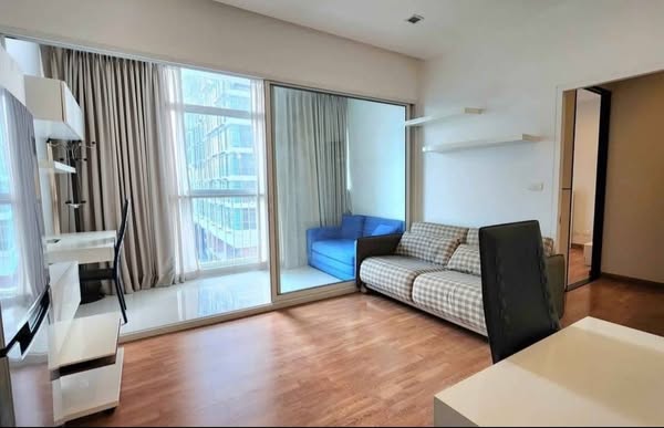 bedroom and living room of The Coast Bangkok