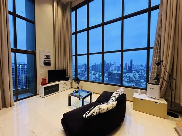 bedroom and living room of The Emporio Place