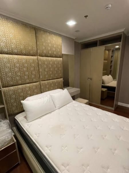 bedroom of The Metropolis Samrong