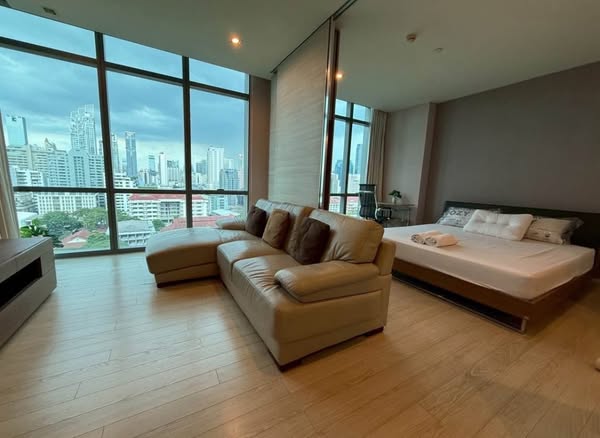 living room and bedroom of The Room Sukhumvit 21